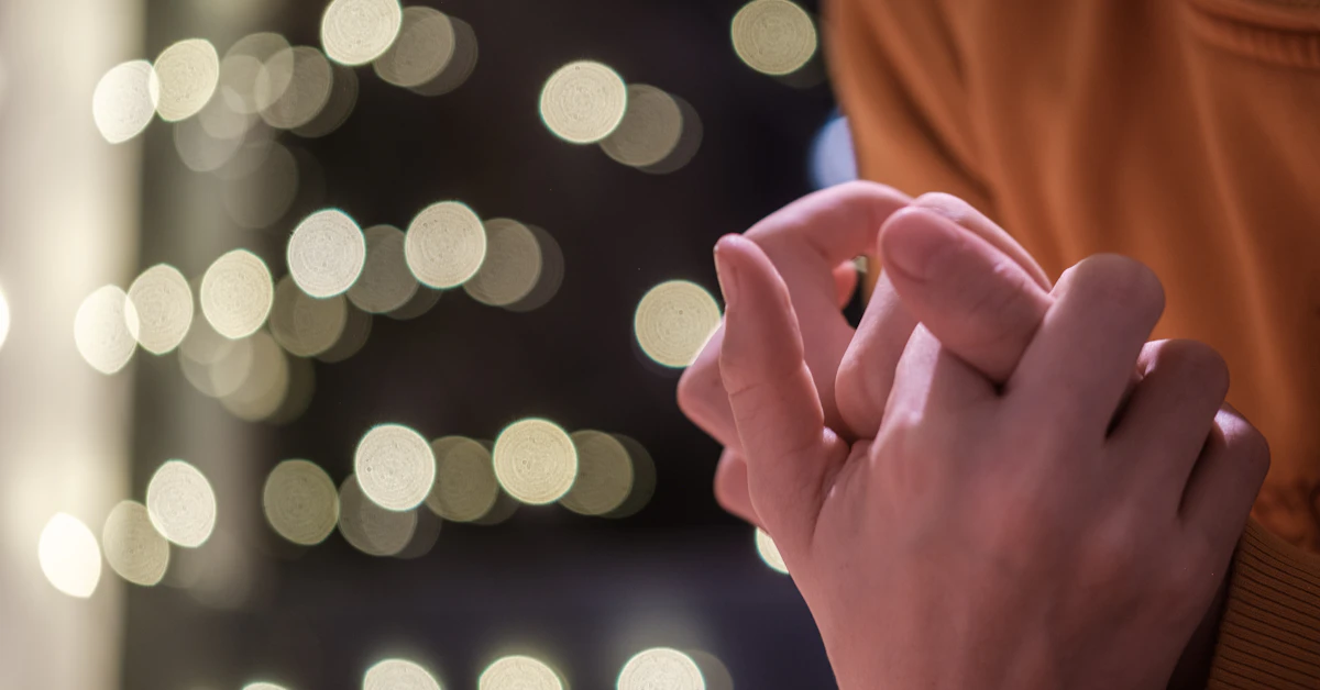 A close up of a person holding a cell phone