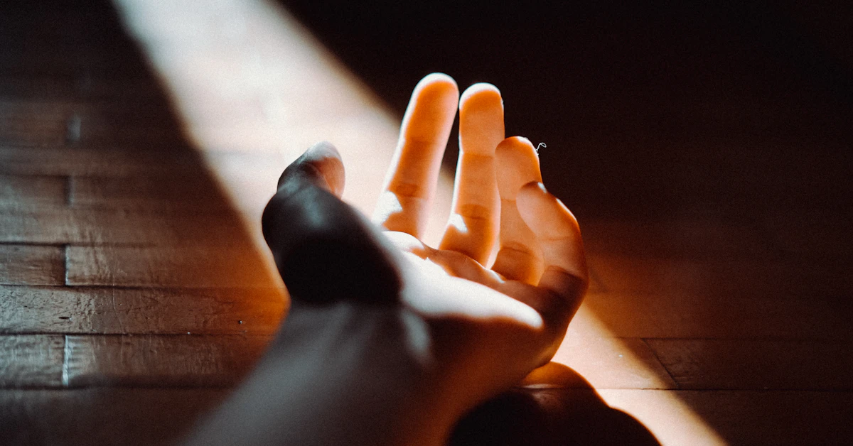 persons feet on brown wooden floor